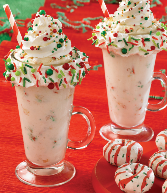 christmas mini donut milkshakes topped with sprinkles and whipped cream
