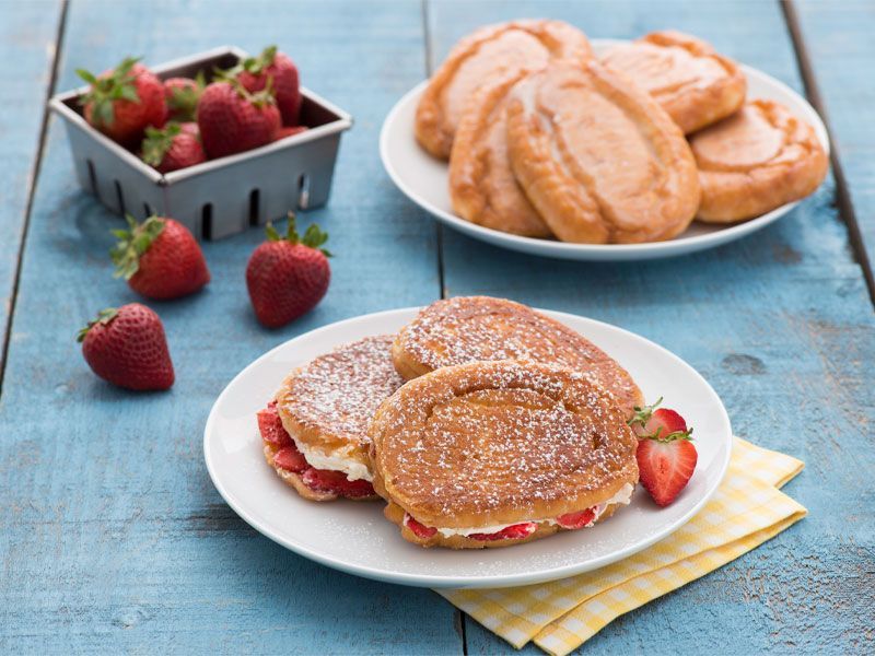 honey bun french toast with strawberries and whipped cream