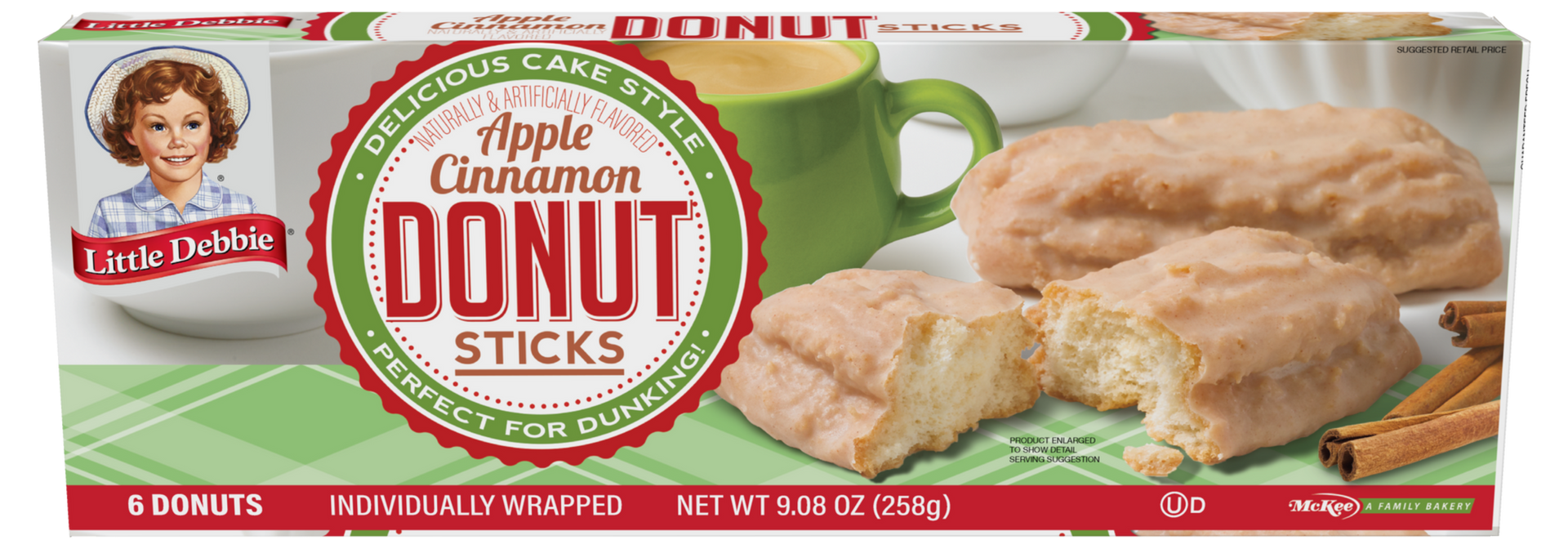 A box of apple cinnamon donut sticks with a green apple in the background.