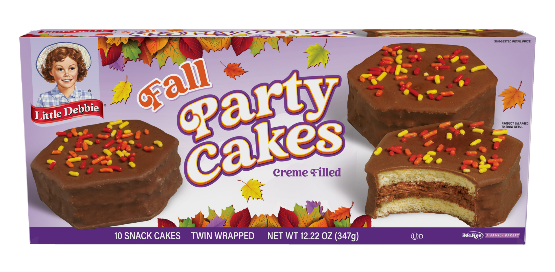 A box of fall party cakes with chocolate frosting and sprinkles.