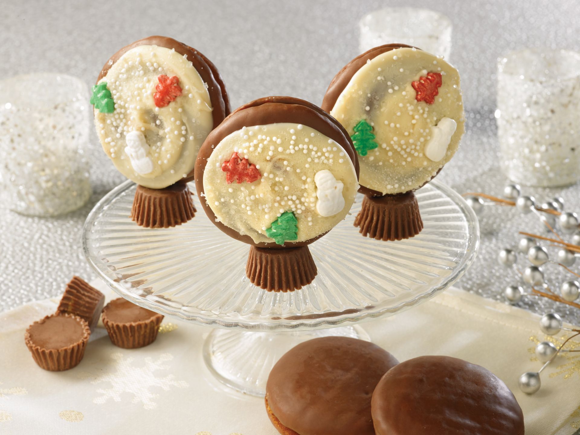 A cookie in the shape of a christmas tree with candy on it