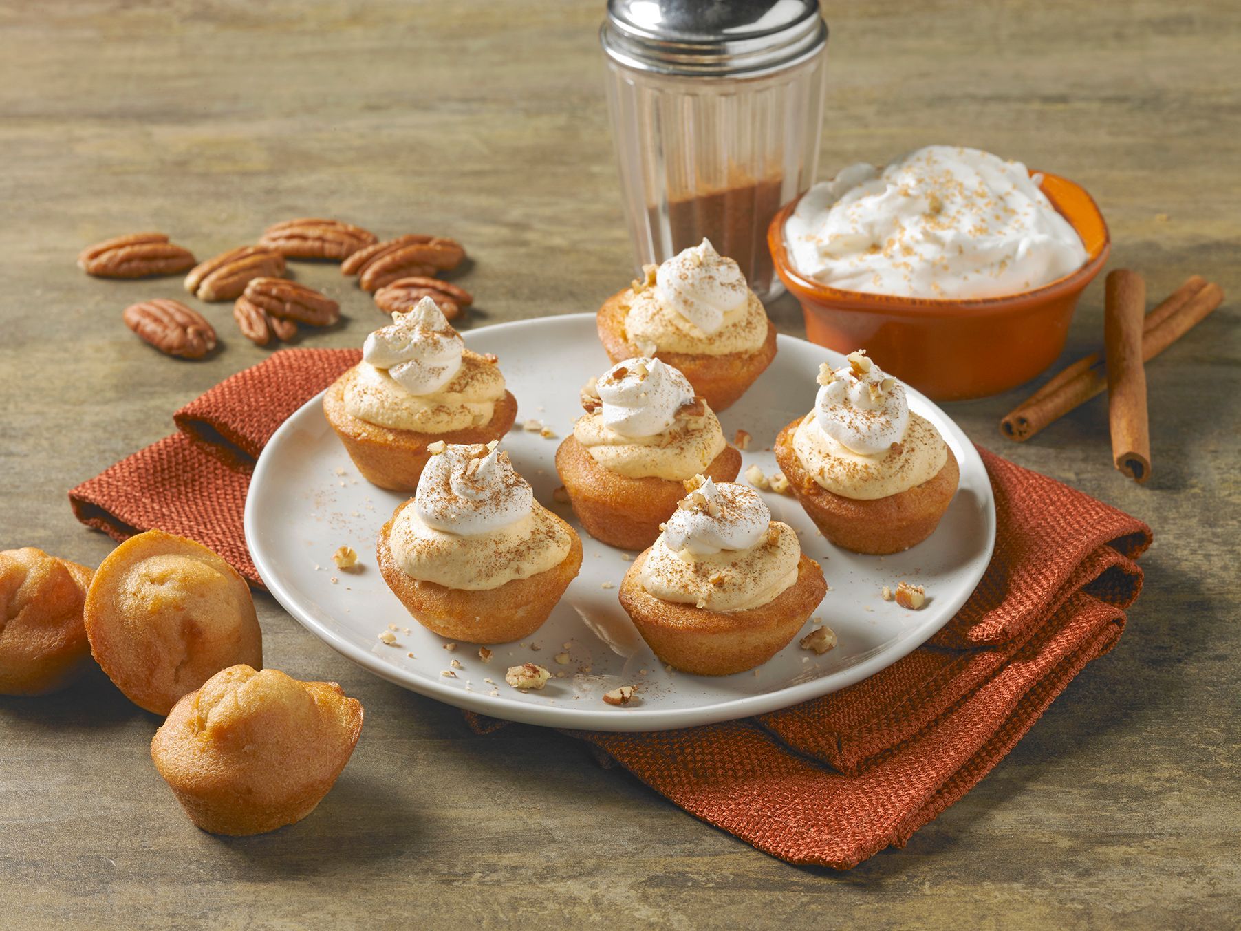 mini muffins topped with whipped topping