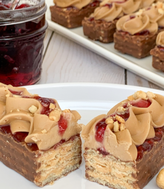 nutty buddy bars topped with peanut butter and jelly
