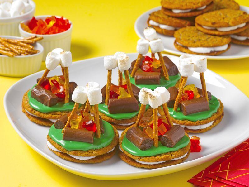 oatmeal creme pies decorated with candy to look like campfires