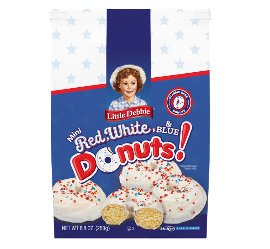 A bag of spring mini donuts with sprinkles on them