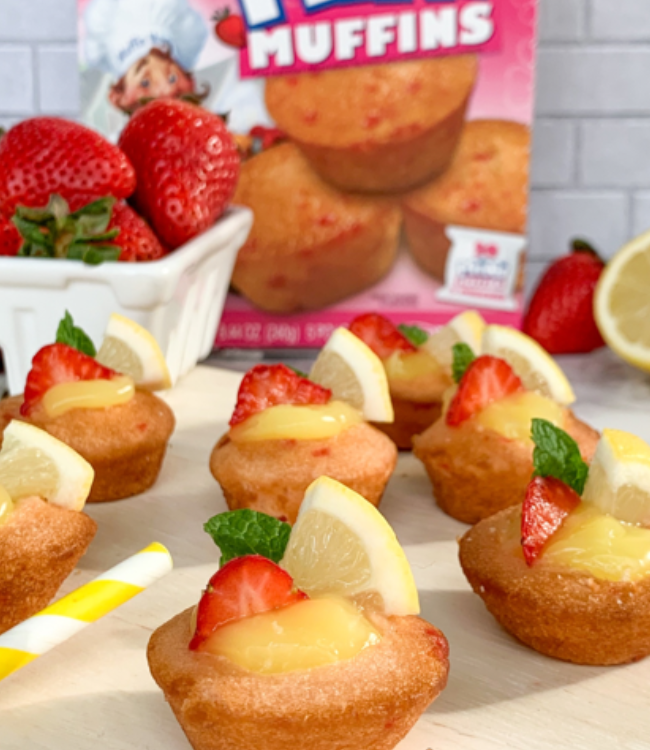 strawberry shortcake muffins topped with lemon curds and strawberries