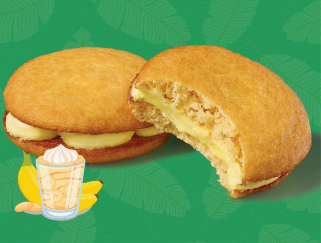 two banana puddin creme pies on a green background 