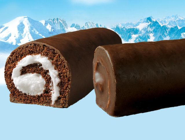 two swiss rolls on a blue mountain background