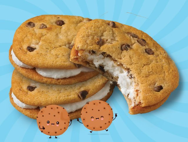 A stack of chocolate chip cookies with a bite taken out of one of them