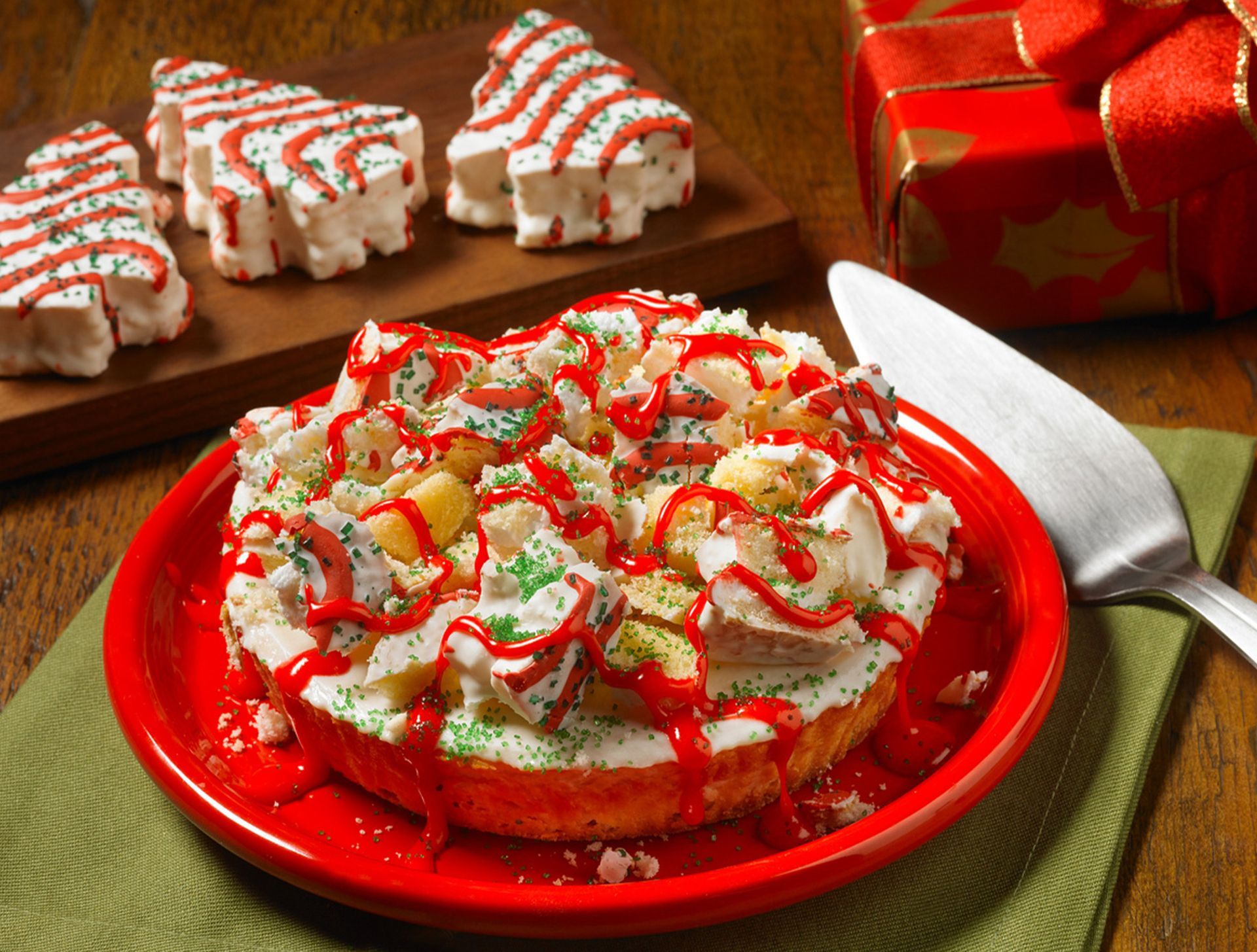 christmas tree cakes cheesecake topped with christmas tree cakes