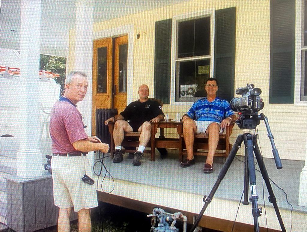 Ric Murray from HVAC-TV filming Dan Holohan's interview with Mad Dog about the Antique Steam Vapor System he had just finished installing from scratch. (2003)