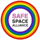 Rainbow logo with “SAFE SPACE ALLIANCE” in pink, black, and white text inside colorful concentric circles