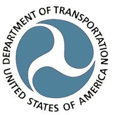 U.S. Department of Transportation seal with blue circular swirl and black text