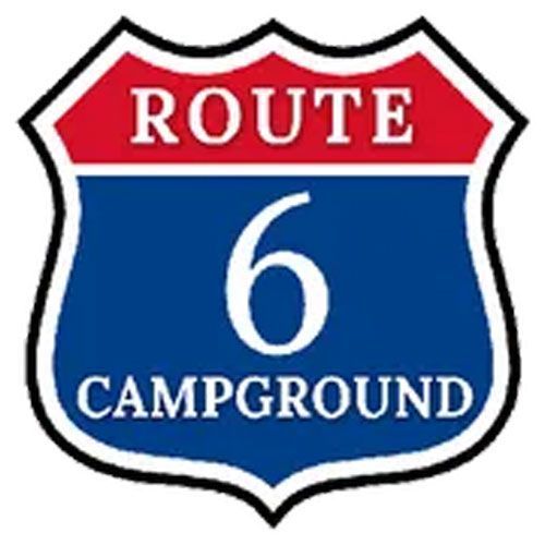 A blue and red route 6 campground sign on a white background.