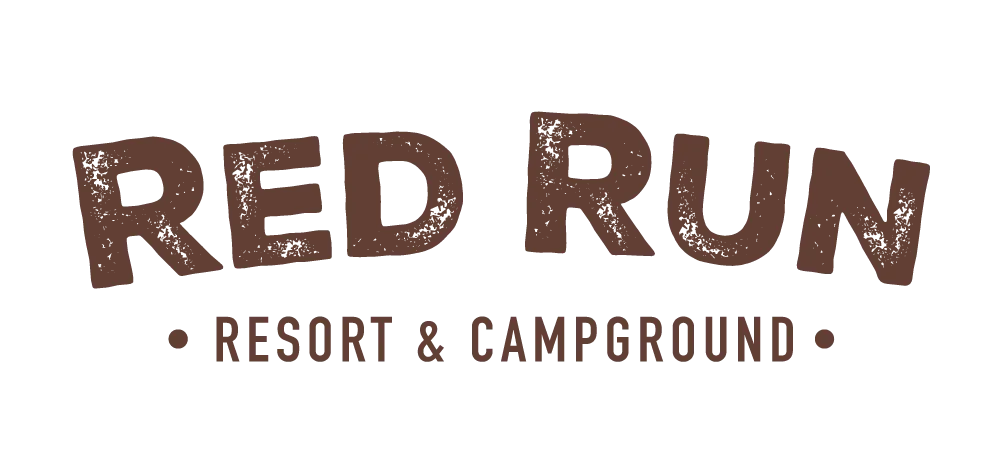 A logo for greene hills resort and campground