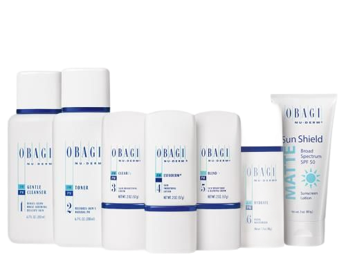 Obagi Nu-Derm skin care products: cleanser, toner, creams, and sunscreen in white packaging.