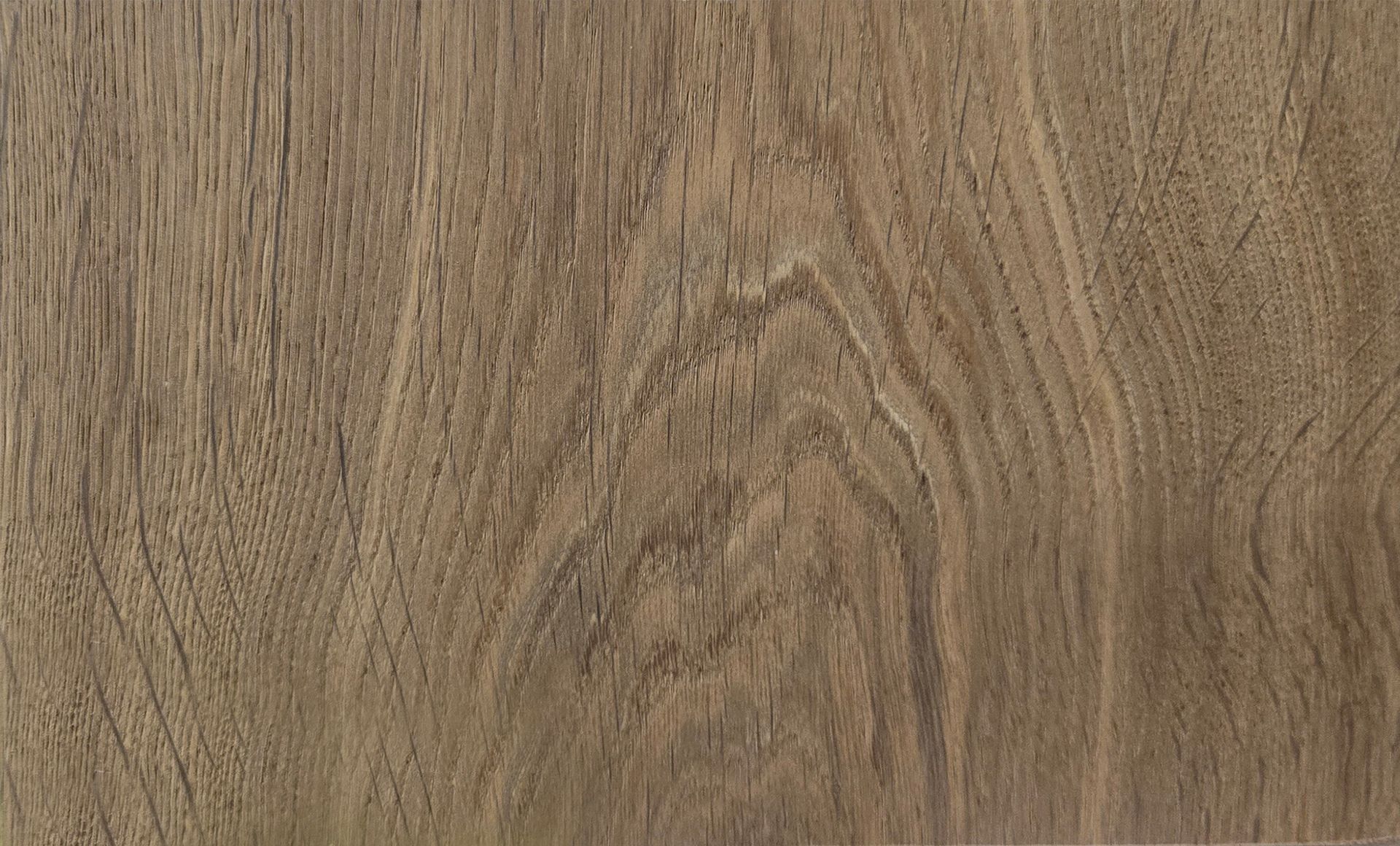 Textura de vetas de madera con remolinos marrones y tostados.