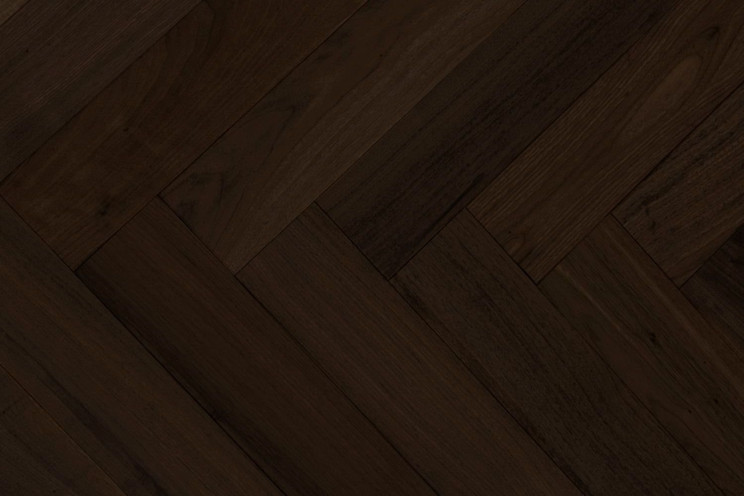 Primer plano de tablones de madera oscura en espiga
