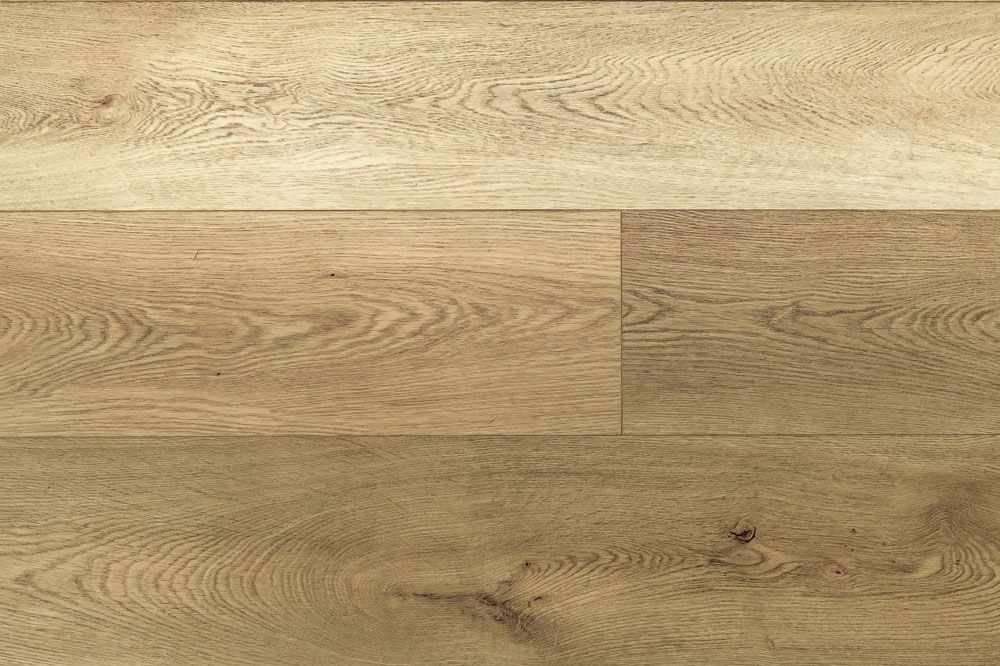 Superficie de tablones de madera clara con vetas y nudos naturales.