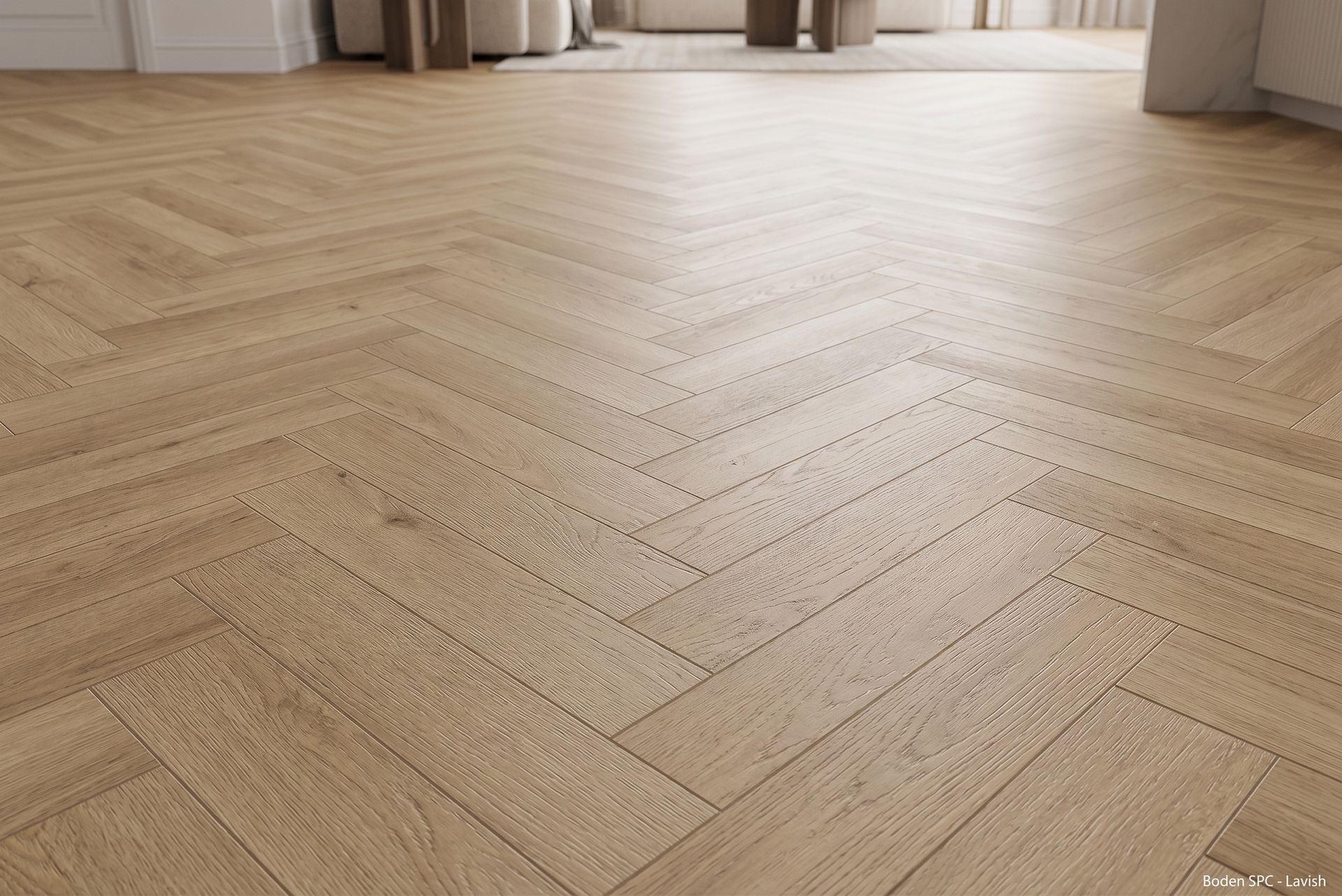Suelo de parquet de madera clara con diseño de espiga.