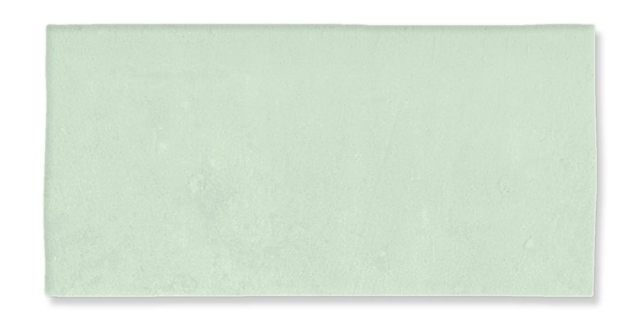 Tarjeta o papel rectangular de color verde menta pálido sobre fondo blanco.