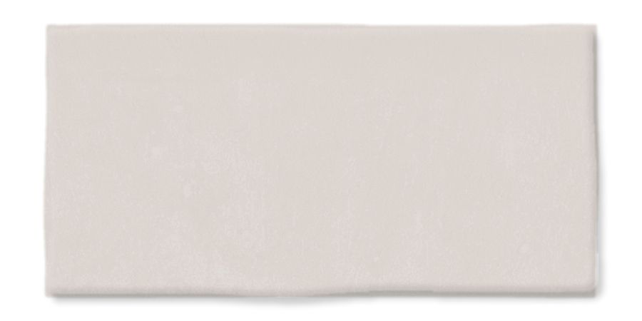 Almohadilla de espuma rectangular blanca sobre fondo liso