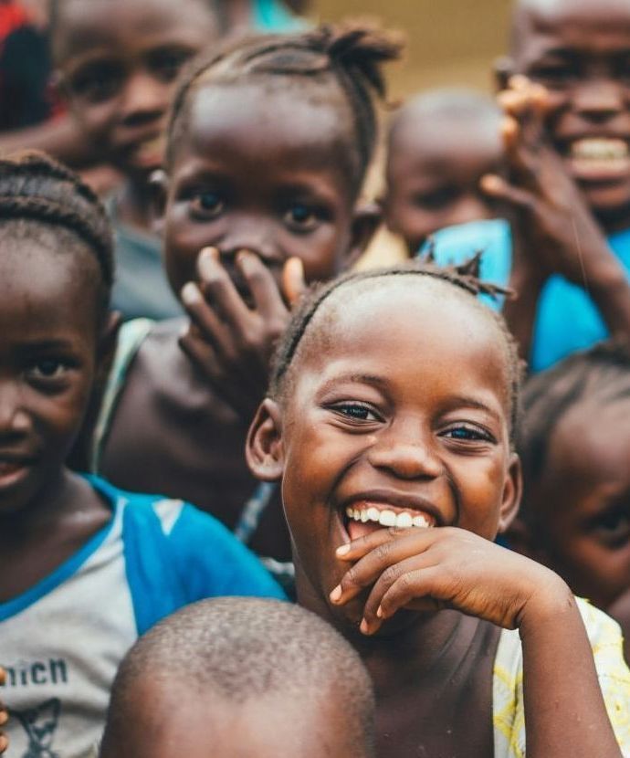A group of children are posing for a picture