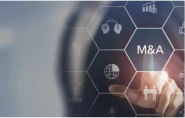 A person is pressing a button on a screen that says m & a