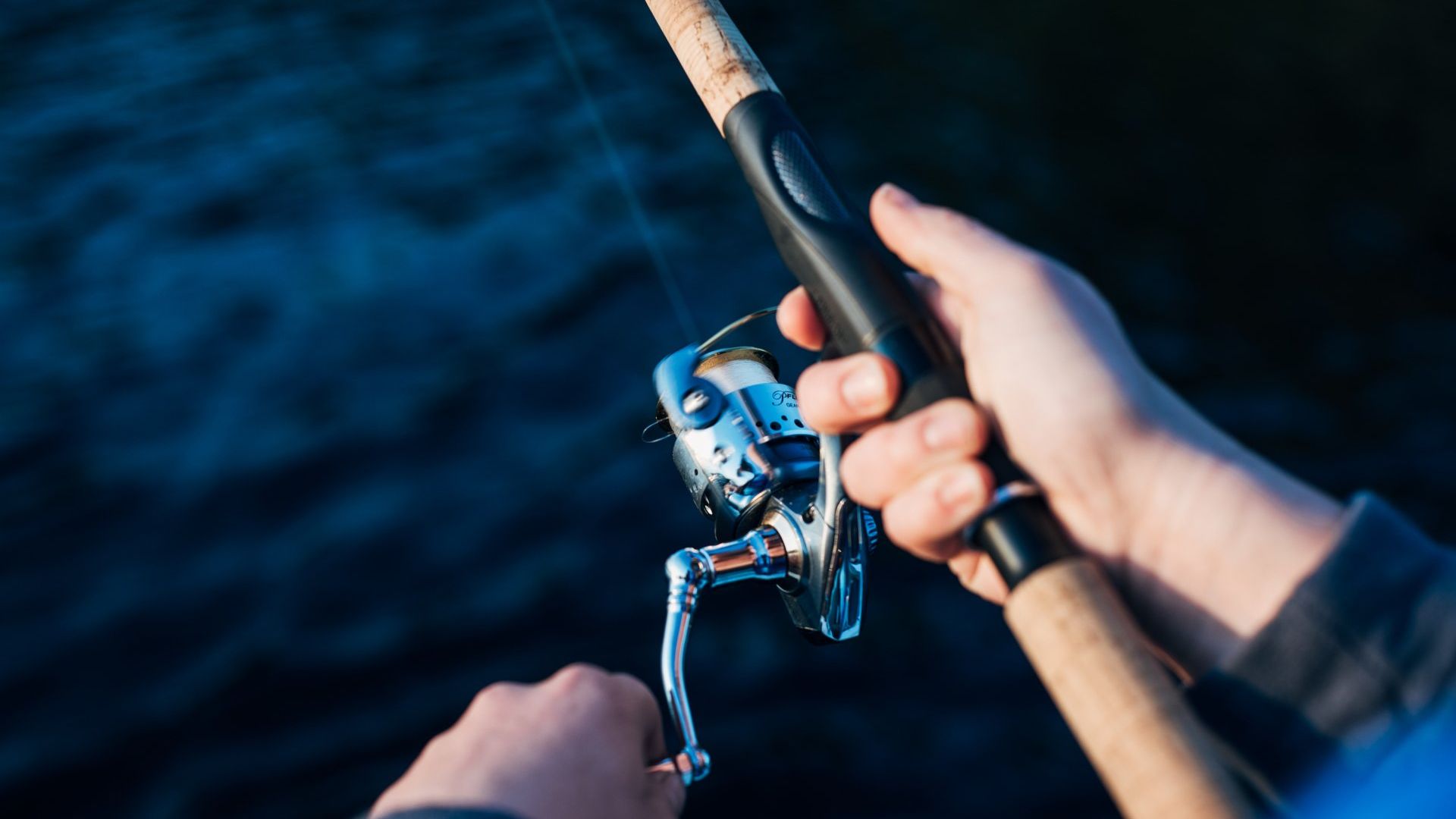 Man holding a fishing rod