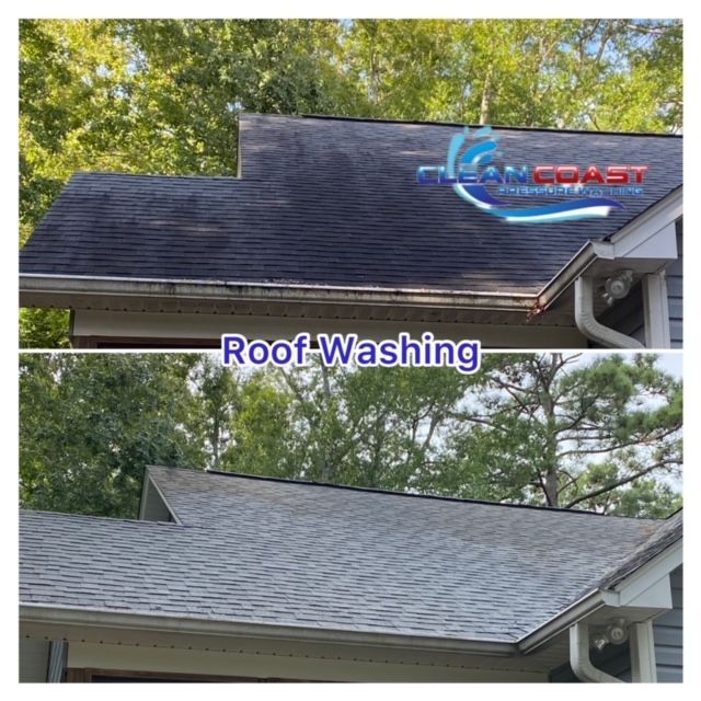 House roof cleaning with pressure tool. Worker on top of building washing tile with professional equipment. Moss removing with water.
