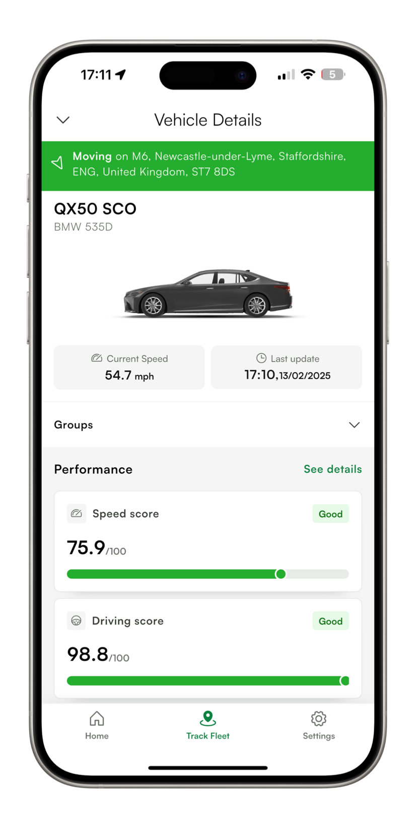 A cell phone with a car on the screen.