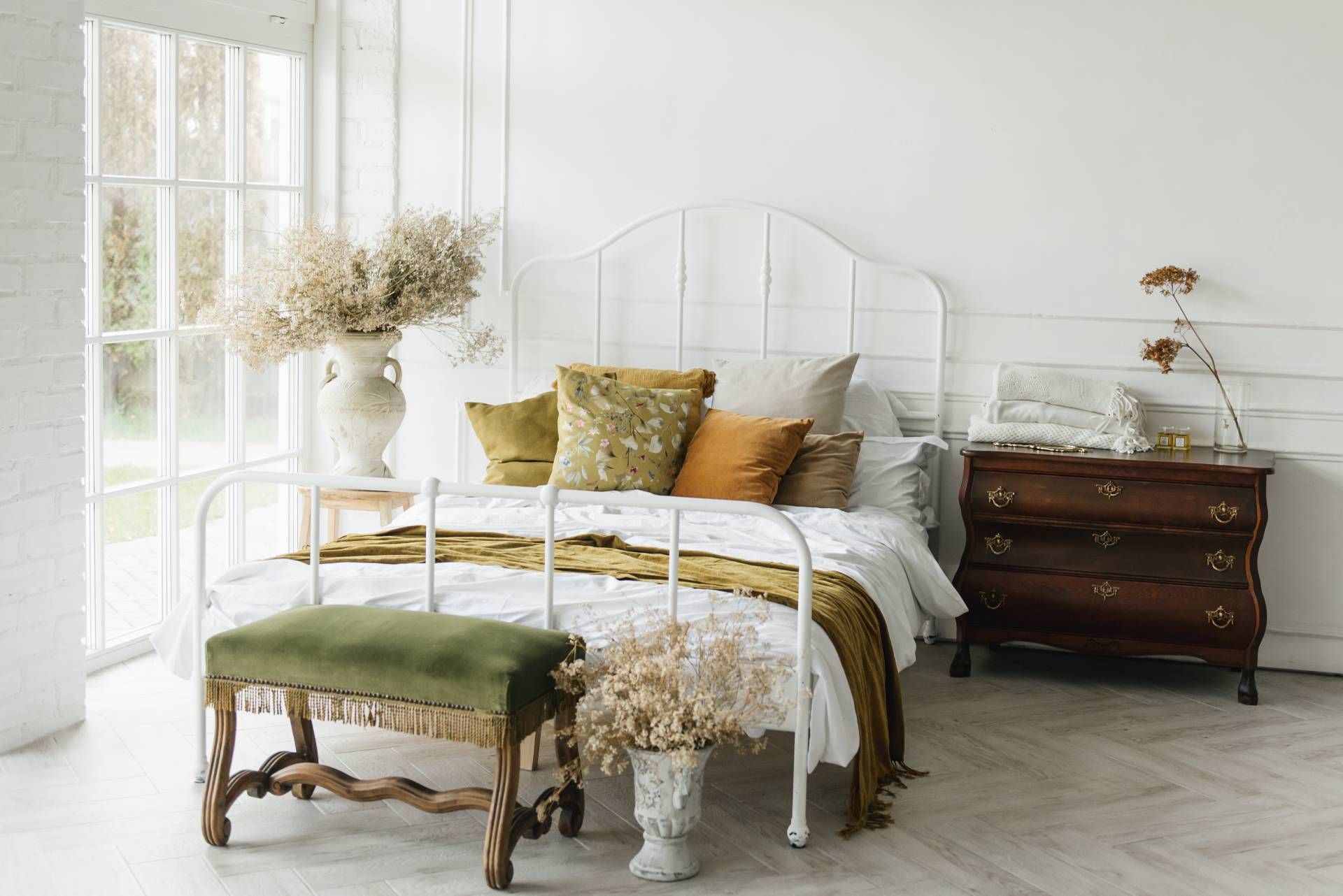 Vintage bedroom designed with one-of-a-kind finds to create a charming and restful space.