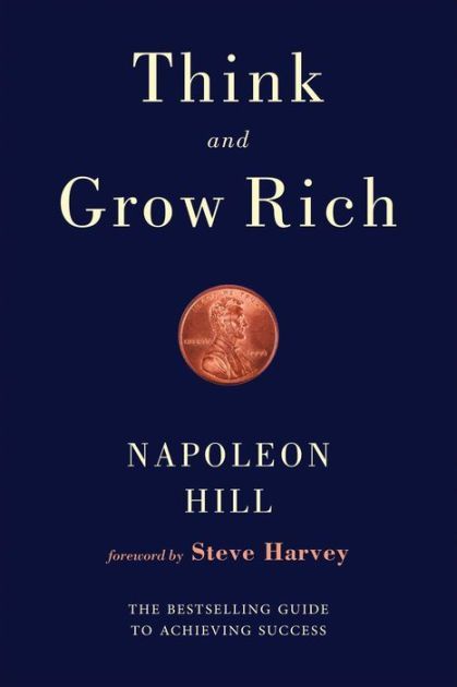 A book titled think and grow rich by napoleon hill