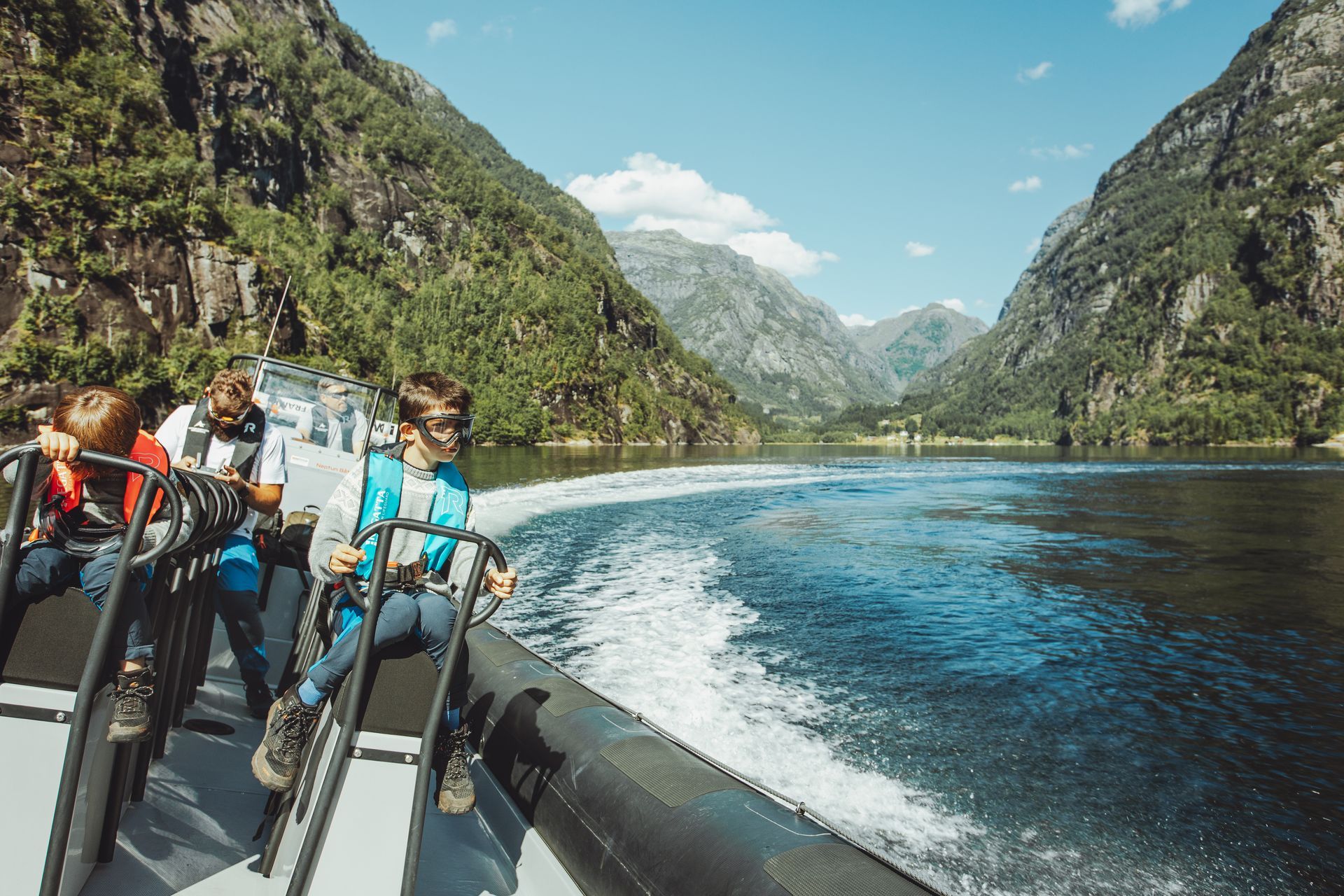 A family on a thrilling RIB safari in Fyksesund