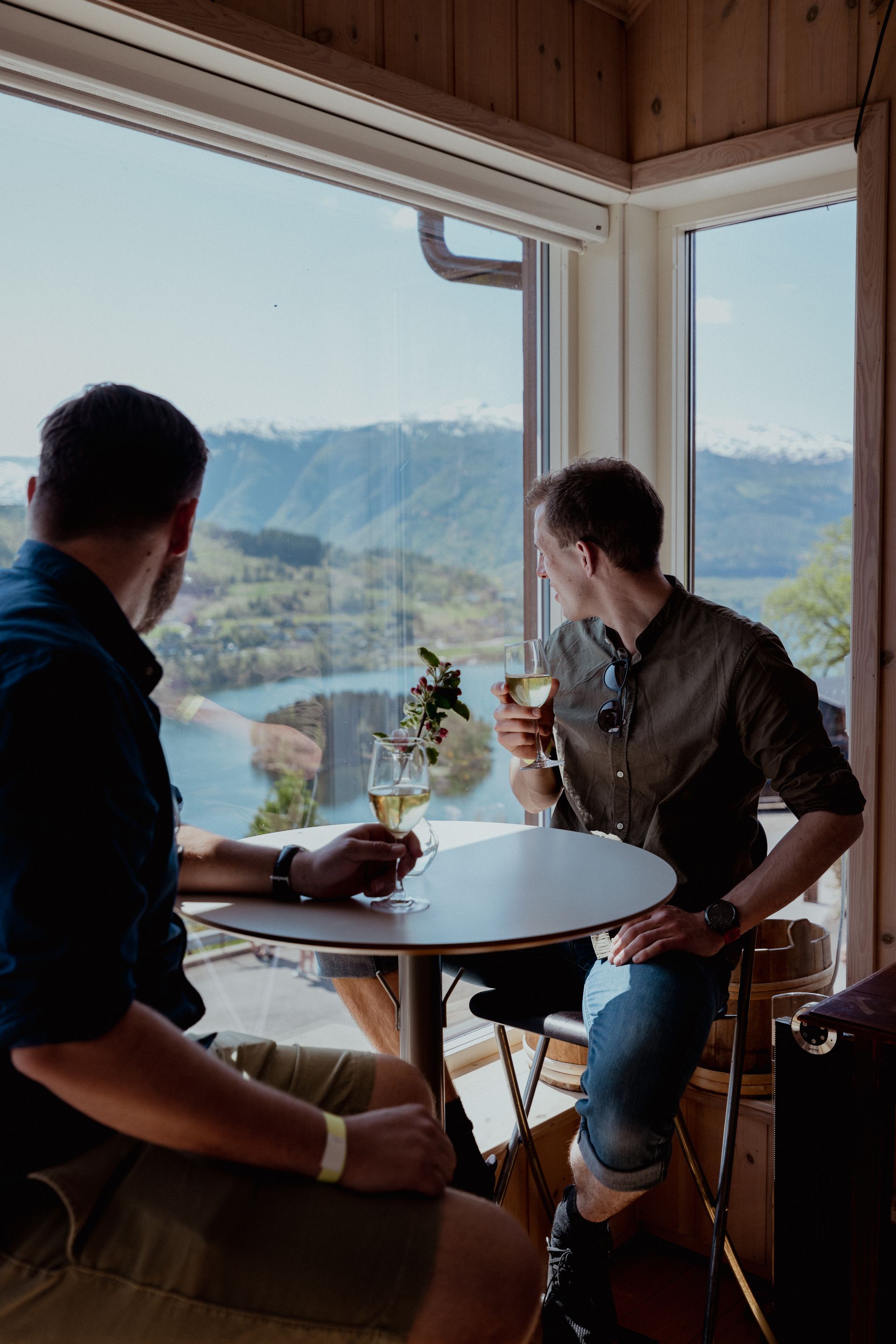 People enjoying a cider tasting in Ulvik, Hardangerfjord