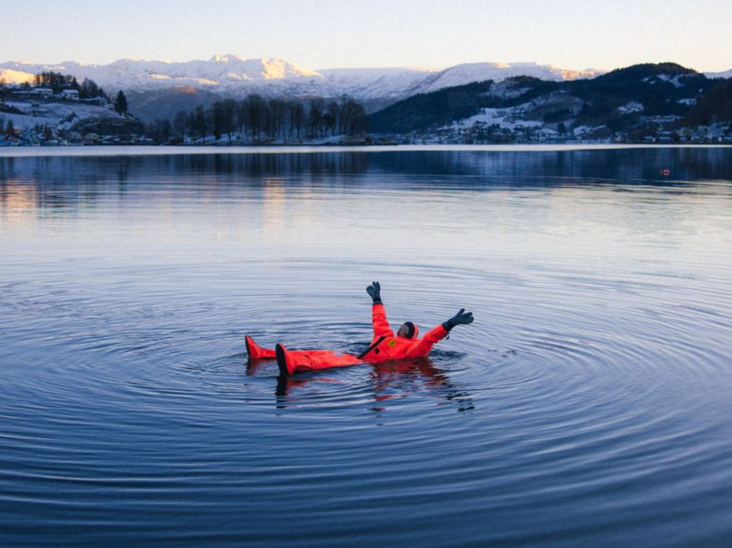 People fjord floating in winter scenery in Norheimsund, Hardangerfjord.
