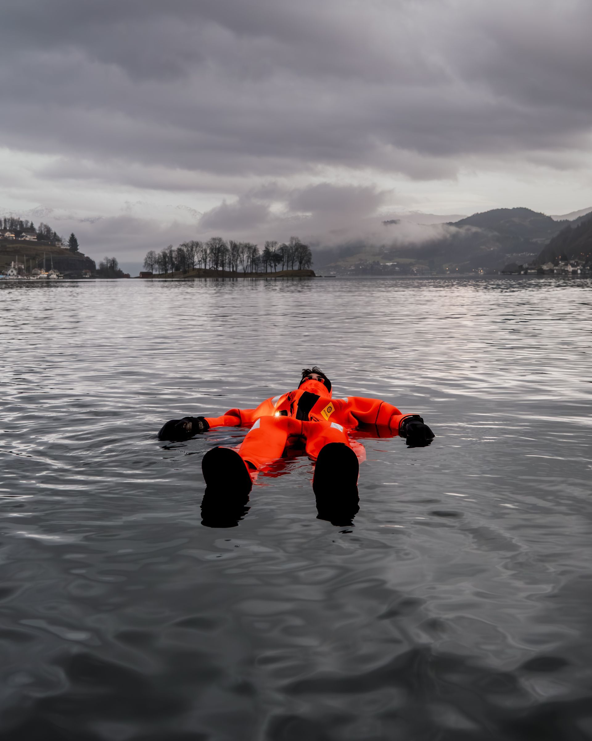 A person floating in a immersion suit in Norheimsund