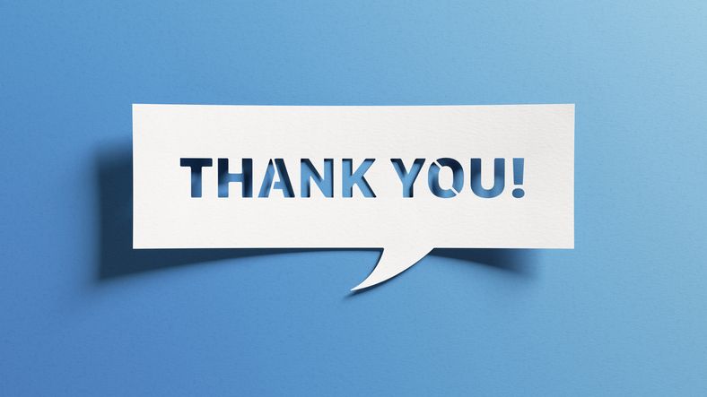 This is a white quote box with cut outs of the words Thank You over a sky blue background.