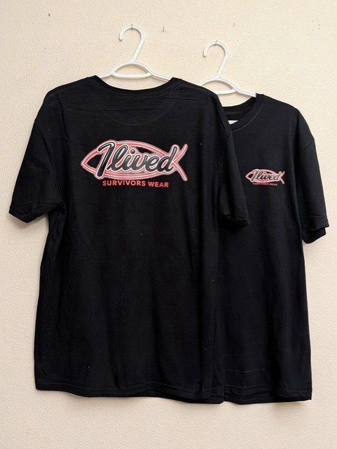 Black iLived Survivors Wear logo T shirts on hangers