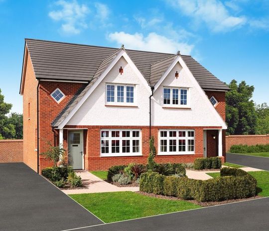 Semi-detached brick and white home with gabled roof under a blue sky.