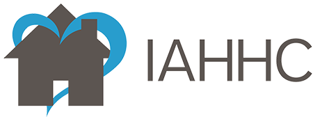 AHHC logo with a gray house and blue accents next to the letters “AHHC”