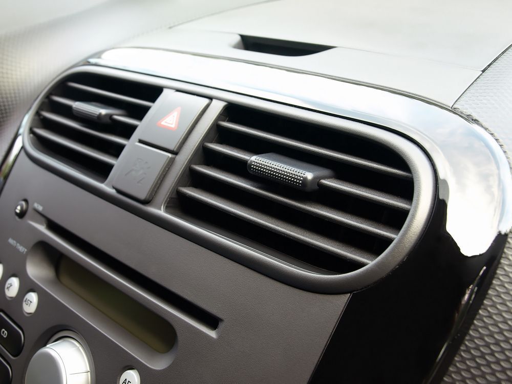 Car Dashboard Air Vent and Center Console With Black and Silver Trim — Van Diemen's Automotive & Electrical Repairs In Bellerive, TAS