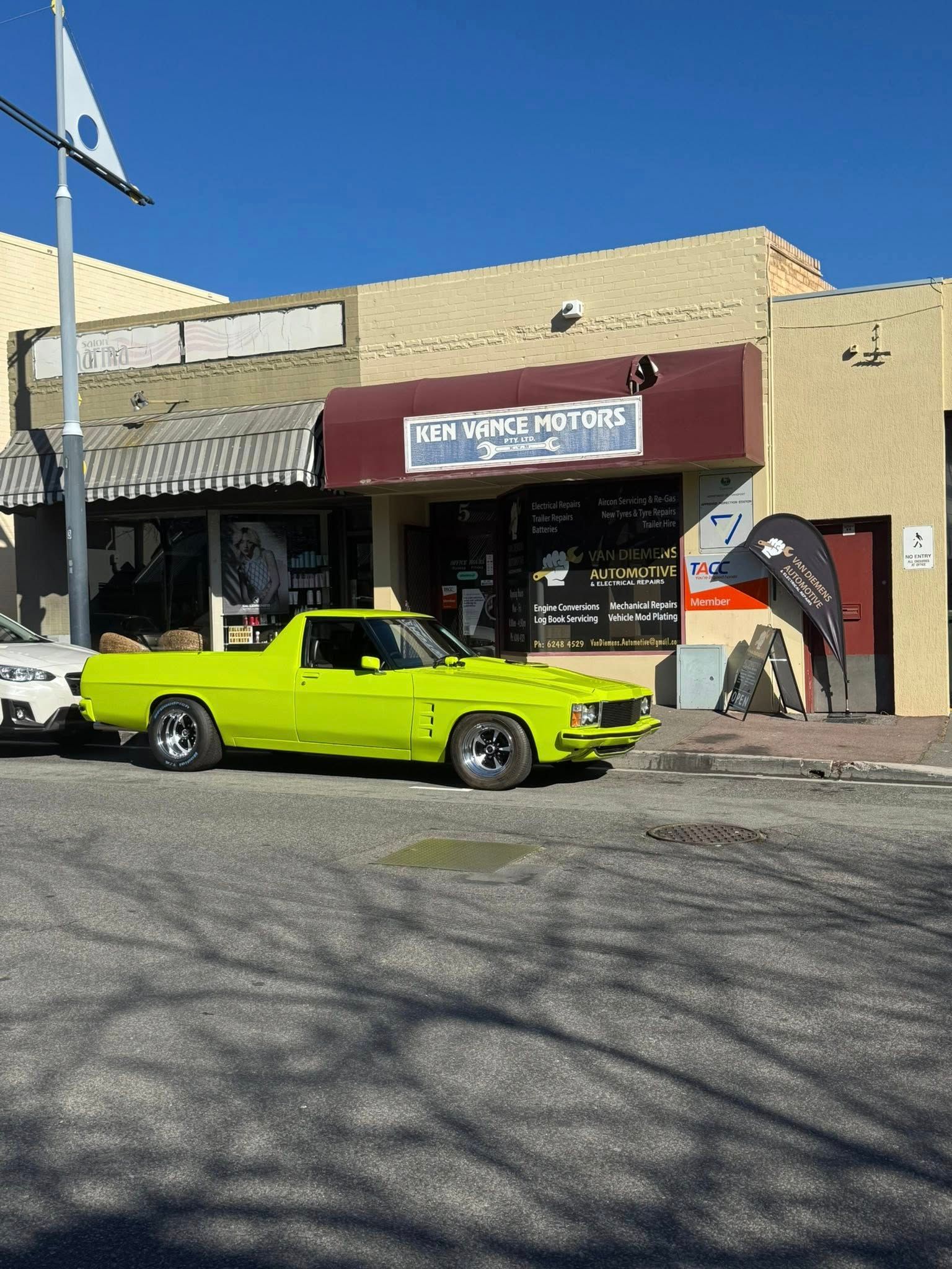 Sports Car Dealership With Three Red Cars — Van Diemen's Automotive & Electrical Repairs In Bellerive, TAS
