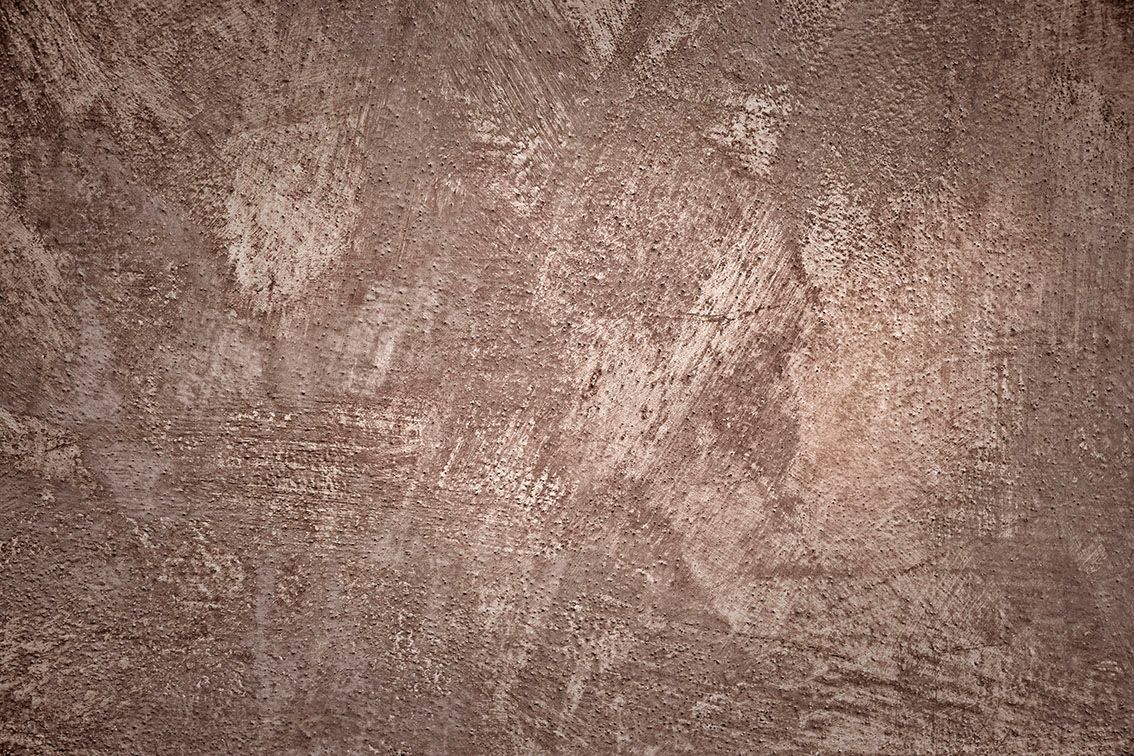 Sfondo astratto marrone con texture e superficie screziata e usurata.
