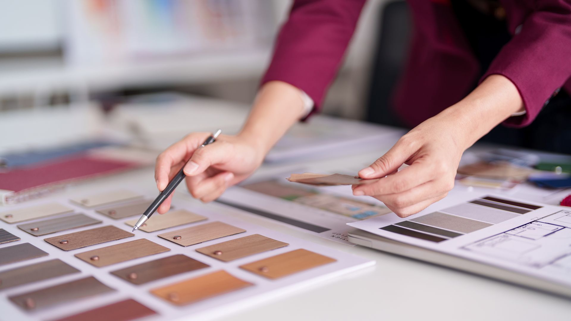 reviewing material color palette for a bathroom remodel