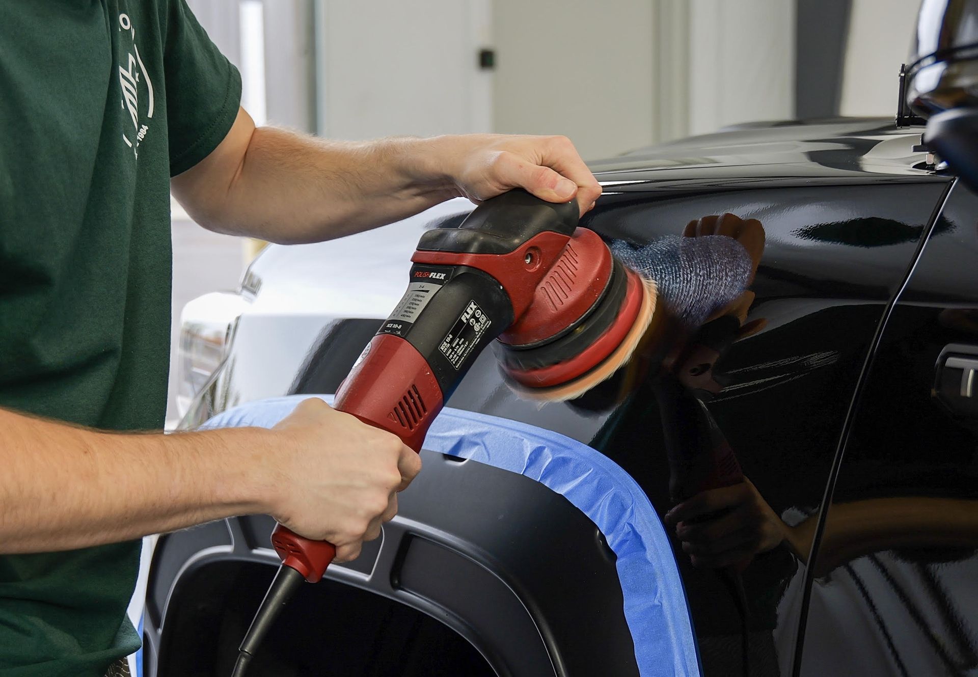 Machine polish on black paint.