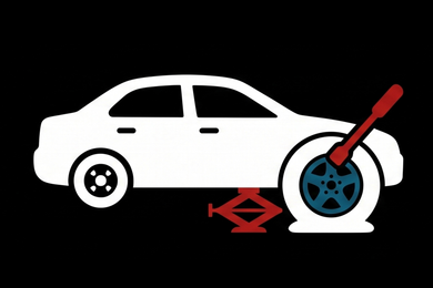 White car lifted by a red jack, with a red-handled wrench on the front wheel.
