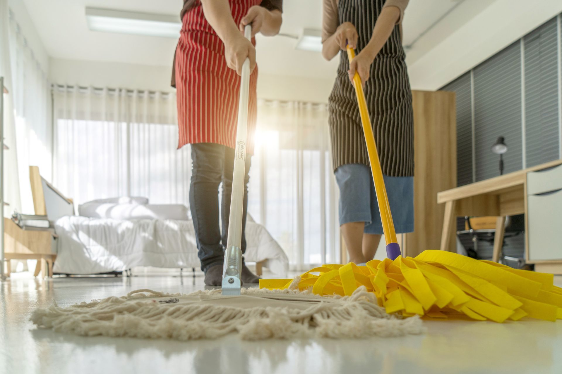 Two Maids Are Mopping The Floor | McKinney, TX | Temps Of McKinney