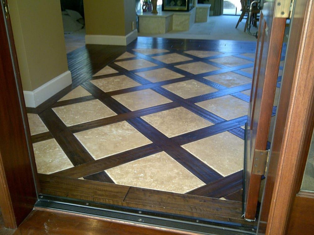 A doorway leading to a tiled floor in a house