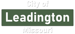 A green sign that says city of leadington missouri on it.